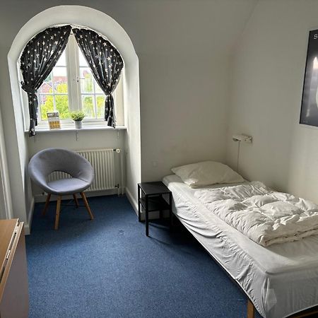 Danhostel Odense City Exterior foto A room at the Internationales Haus