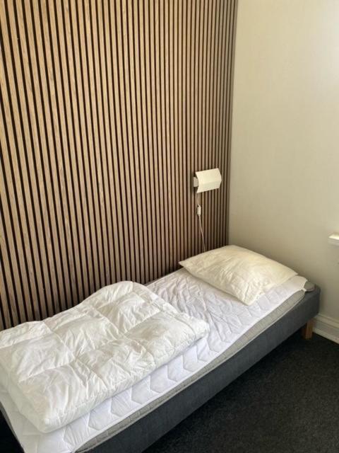 Danhostel Odense City Exterior foto A bed with a duvet